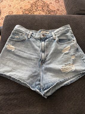 Levi’s High-Rise Light Blue Distressed Denim Mom Shorts